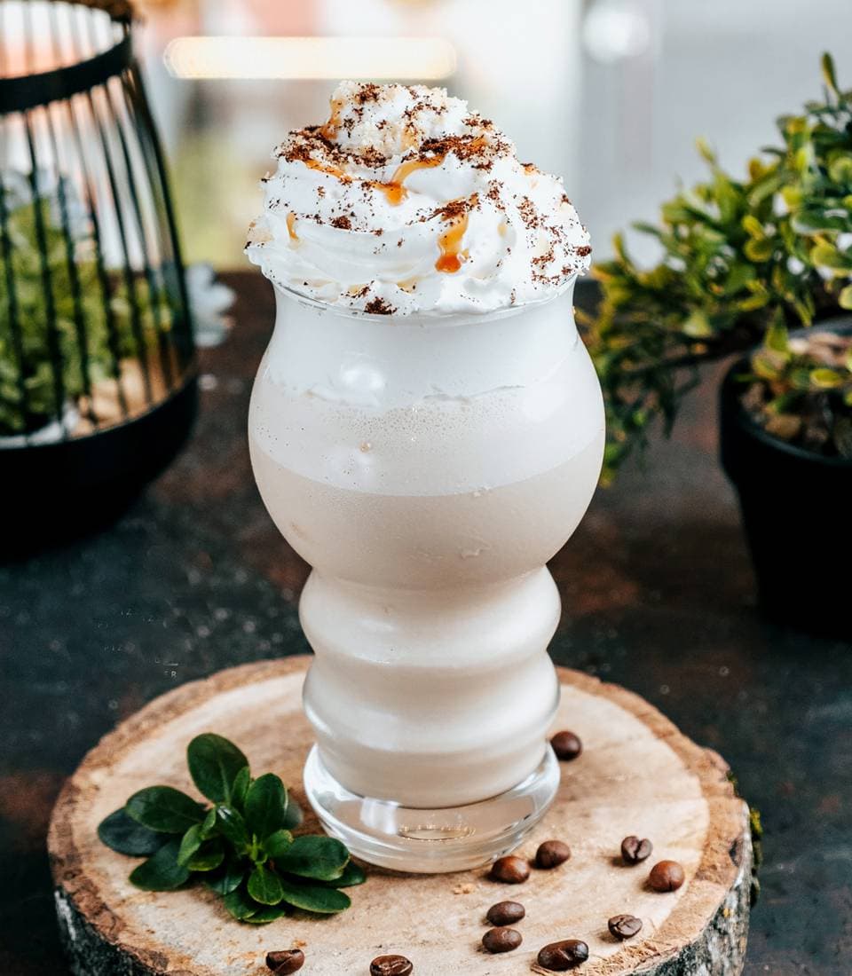 A creamy coffee drink finished with caramel and cocoa.