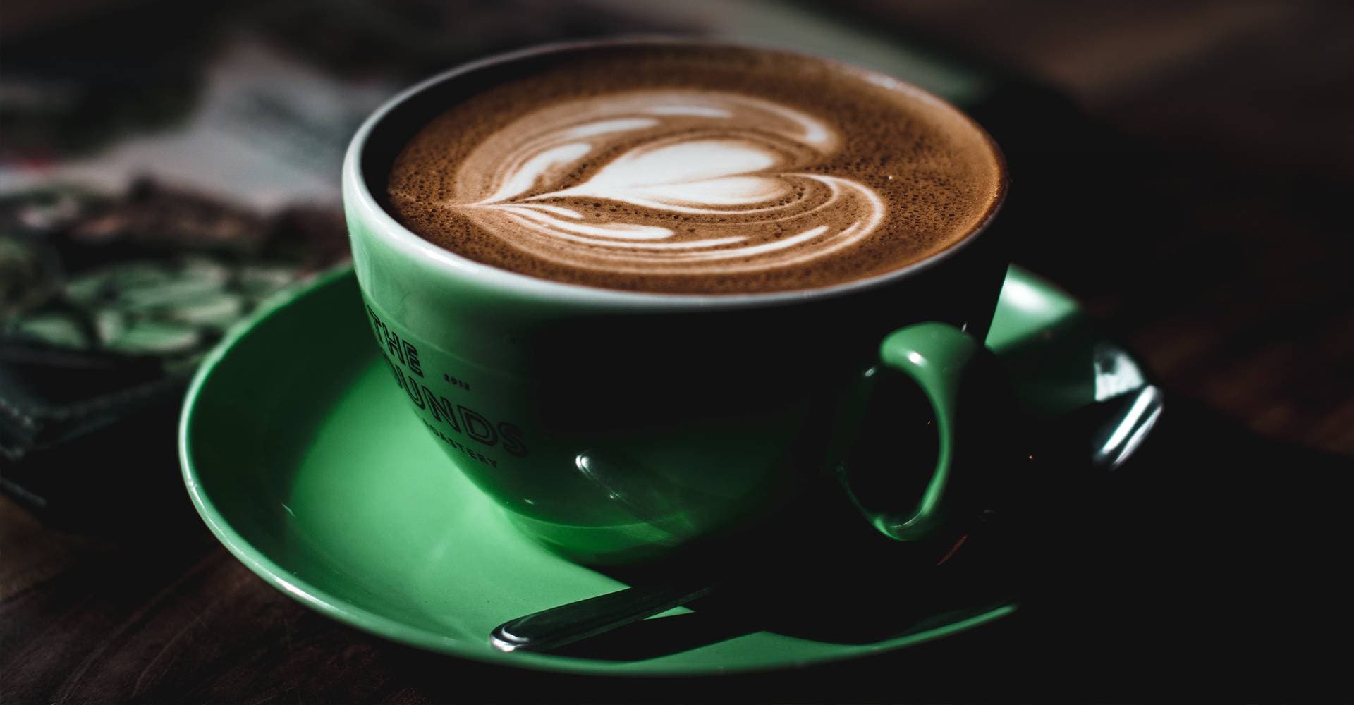 A green cup of coffee at The Perk in Massapequa.